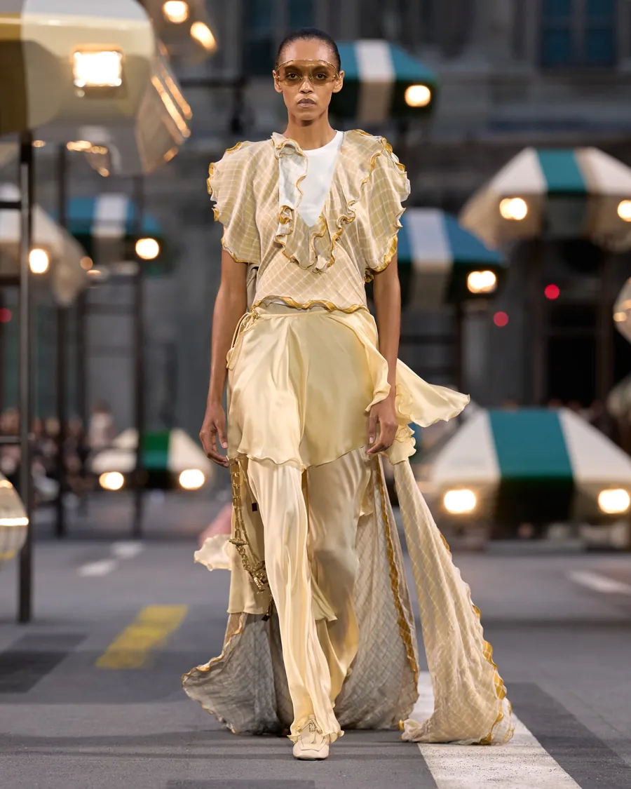 Look 28 of the Louis Vuitton Spring-Summer 2027 collection: a flowing pale yellow ensemble with ruffles