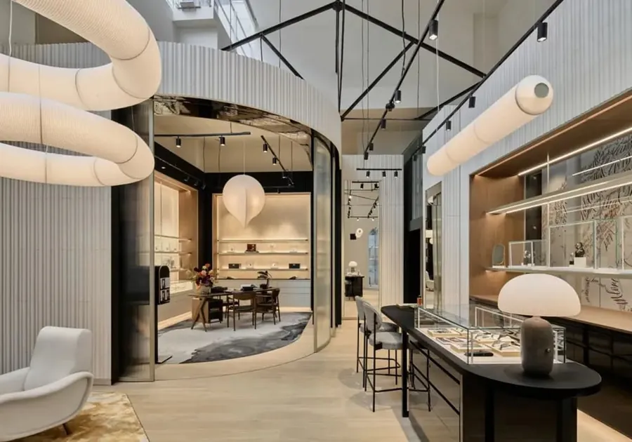 Interior of the Montblanc George Street boutique with curved walls, display cases and an armchair
