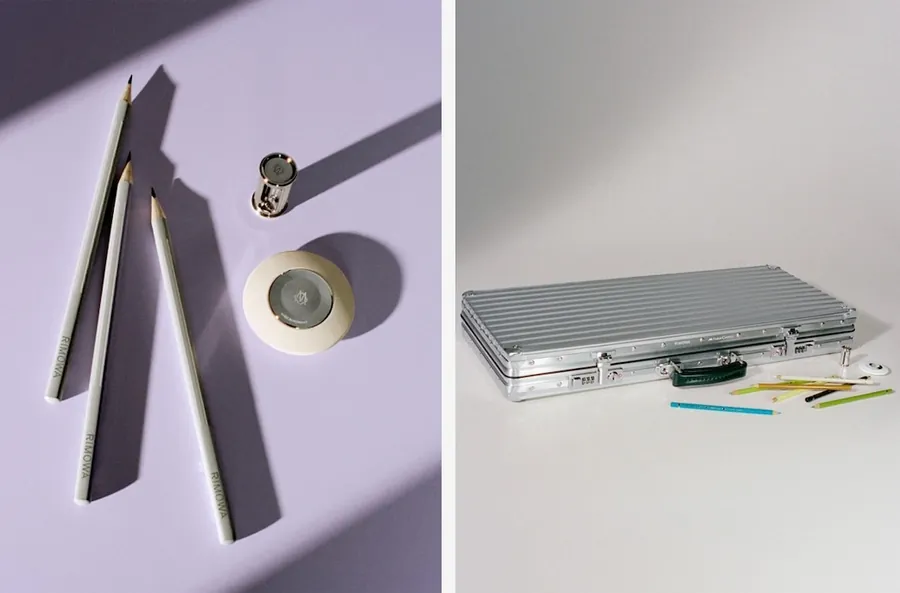 Pencils and drawing tools on a lilac surface, beside them the closed RIMOWA × Faber-Castell Artist Case
